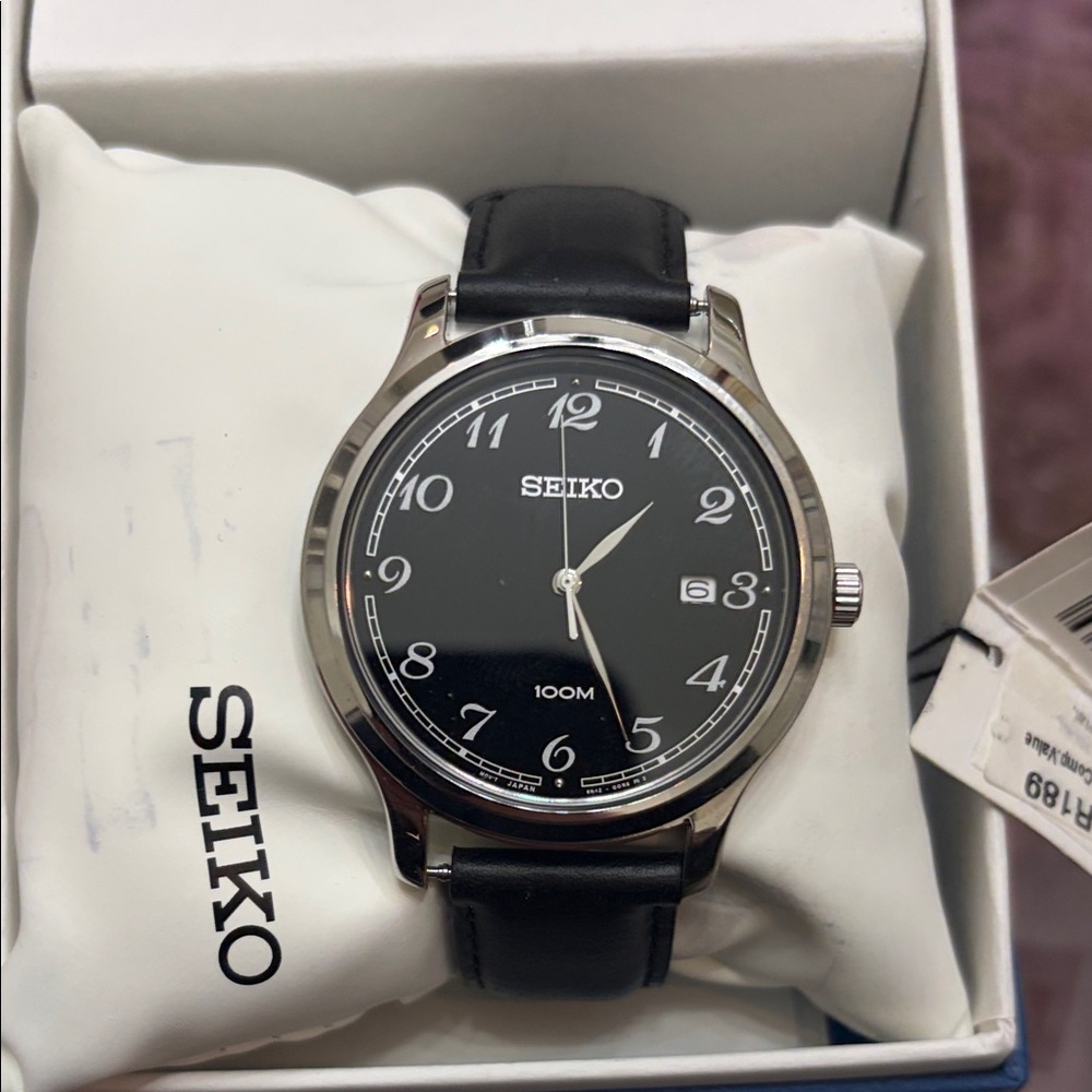 Seiko Black and Silver Watch with Leather Band